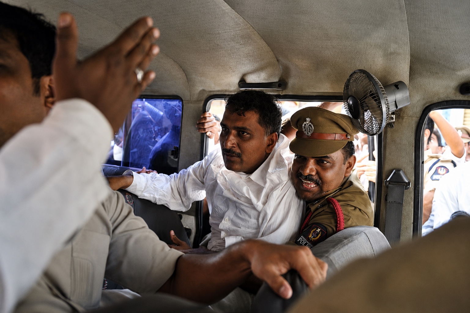 Police detain TRS MLA T. Harish Rao during a Telangana agitation protest in Hyderabad, 22 February 2011
