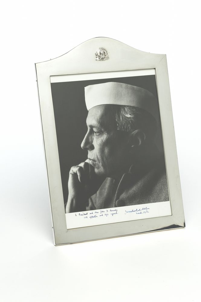 Black and white studio portrait photograph of Jawaharlal Nehru presented to the US